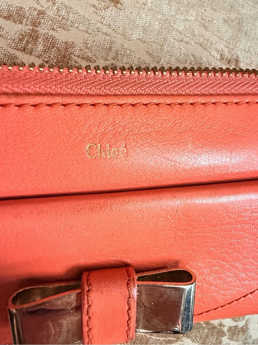 Chloe Coral Pink Leather Zip Clutch Wallet with Silver Bow Accent EUC